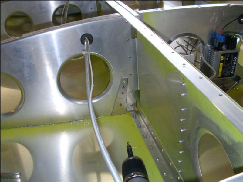 Drill and cleco tiedown to rib 9 A5 rivet holes.