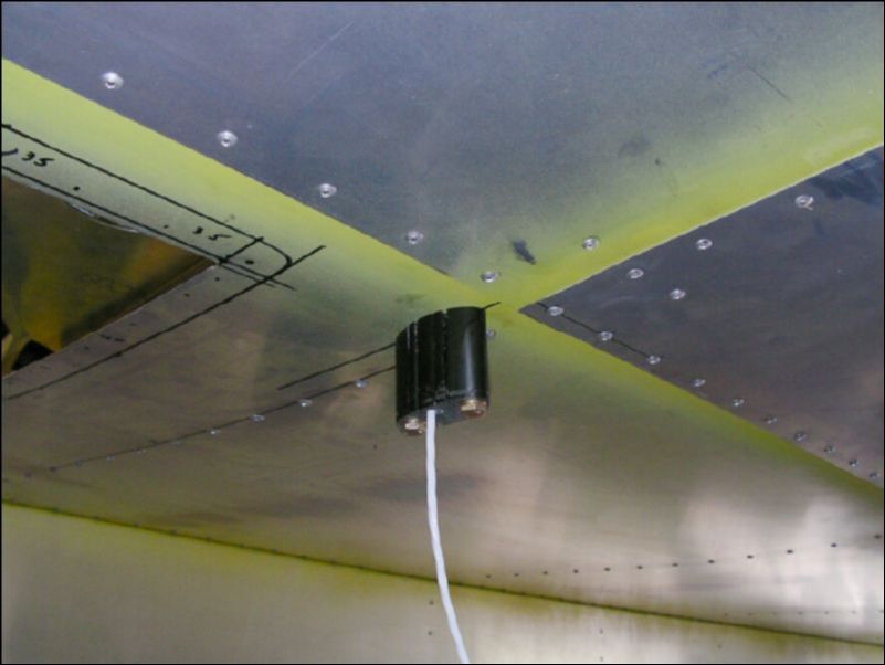 Begin install of Rite Angle system.  Drill bolt holes and wire hole and attach Polymer to bottom of right wing beside the inspection hole.