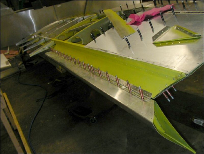 Finish drilling the aileron hinge and cleco in place.