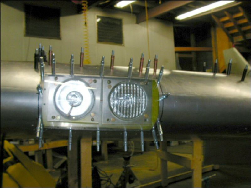 Install new riblet and insert lense in wing.  Drill and cleco lense in place with #40 drill bit.