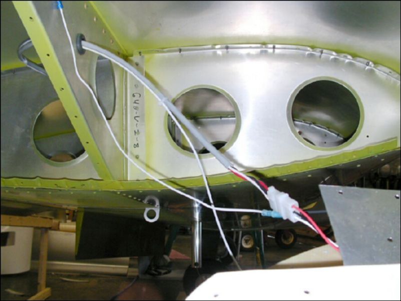 Wire wing tip light and strobe light.