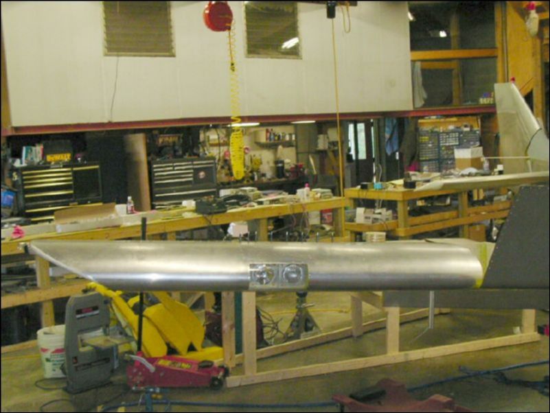 Rivet the right wing outer skins and wing tip.