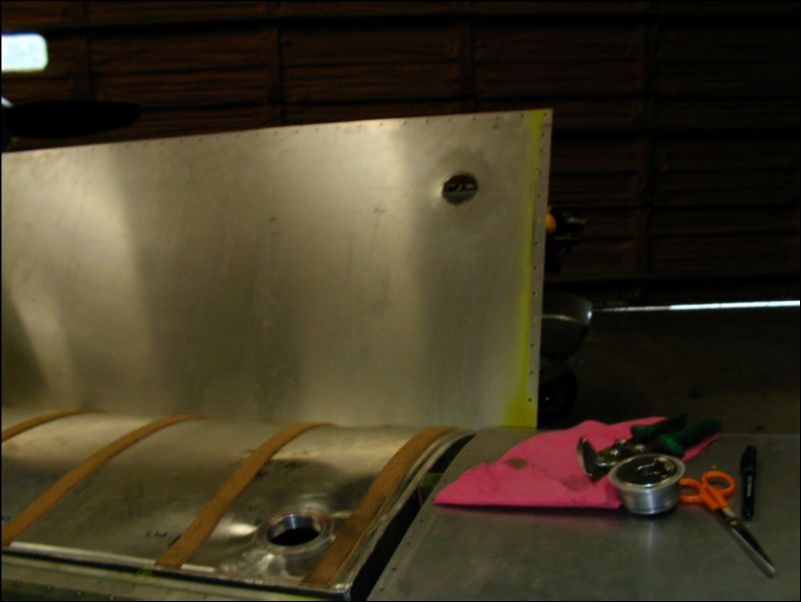 Cut hole in top skin for fuel tank cap.