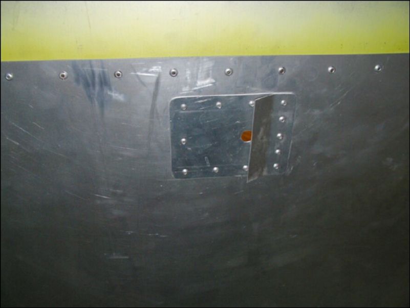 I added a plate to the bottom of the wing skin to cover the hole I had made for the fuel tank vent.  This worked out very nicely.