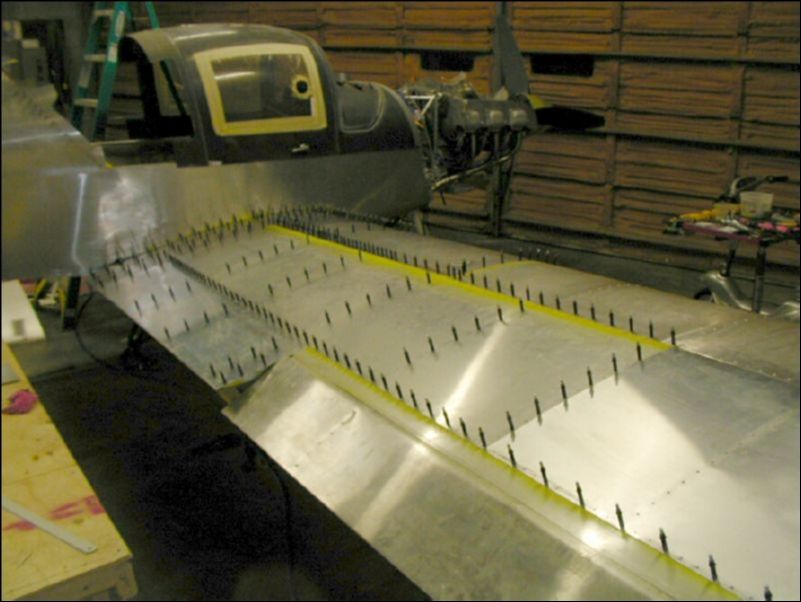 Close the wing skins and cleco in place.